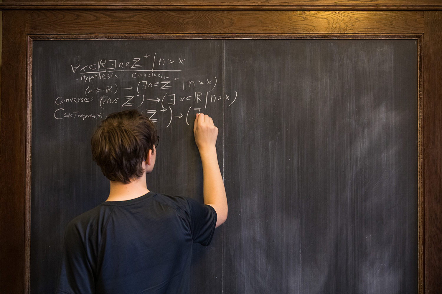 A student studies works a math problem inside Ayres Hall during the first day of fall classes 